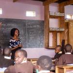 Karem-classroom-studentraisinghand