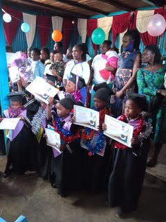 kindergarten graduates celebrating