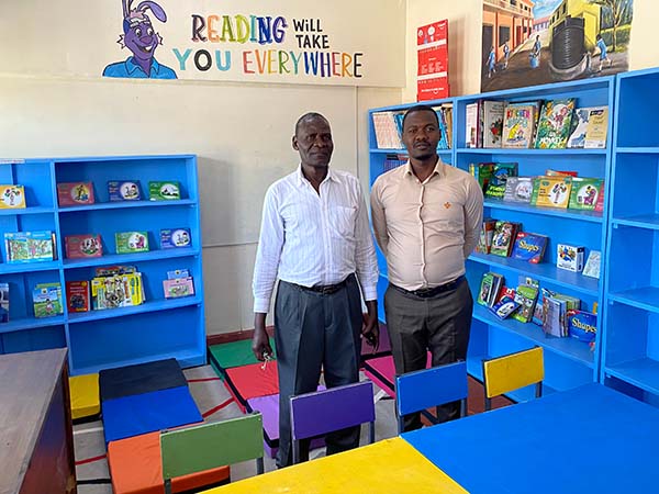 teachers standing in the kicoshep library