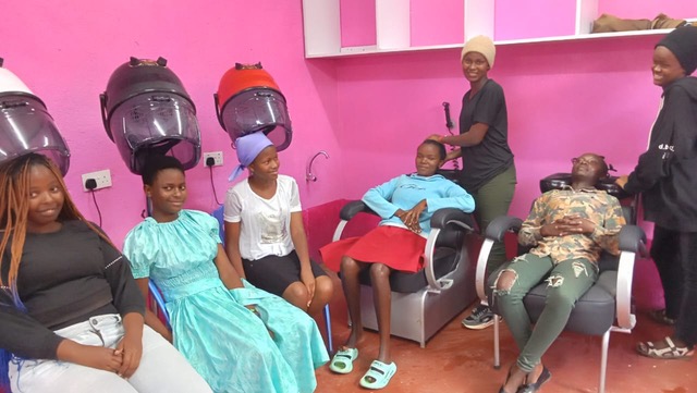 Thika-Cosmetology1 students getting their hair done at Thika