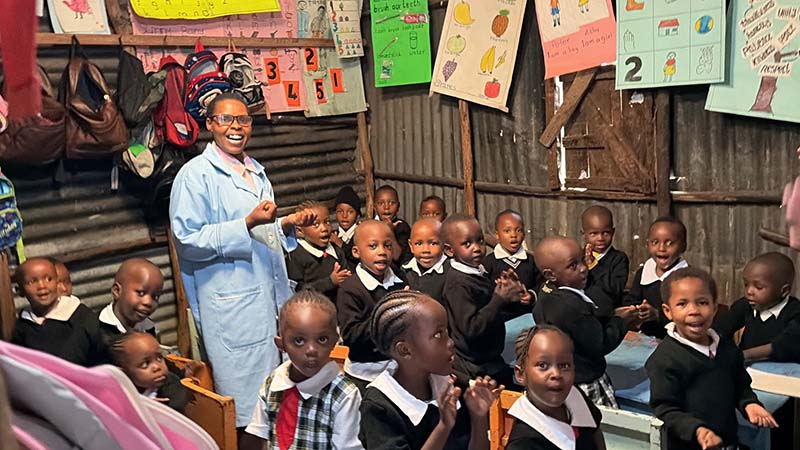 classroom of children with their teacher